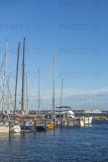 Strande marina near Kiel, Rendsburg-Eckernförde district, AIDA, ship masts, dolphins, Baltic Sea, sailing, leisure activities, water sports, maritime atmosphere, summer, blue sky, sunshine, Bay of Kiel, Schleswig-Holstein, Germany