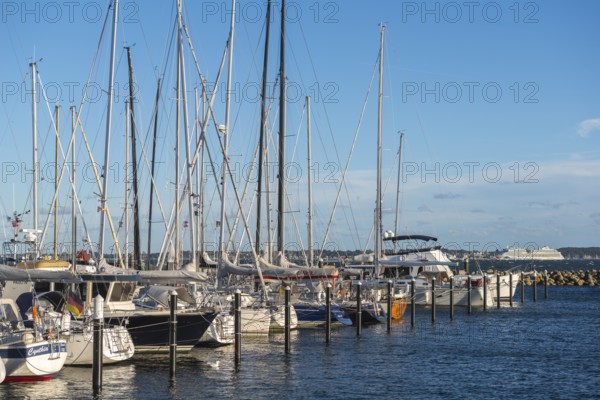 Strande marina near Kiel, Rendsburg-Eckernförde district, AIDA, ship masts, dolphins, Baltic Sea, sailing, leisure activities, water sports, maritime atmosphere, summer, blue sky, sunshine, Bay of Kiel, Schleswig-Holstein, Germany