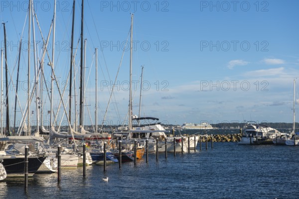 Strande marina near Kiel, Rendsburg-Eckernförde district, AIDA, ship masts, dolphins, Baltic Sea, sailing, leisure activities, water sports, maritime atmosphere, summer, blue sky, sunshine, Bay of Kiel, Schleswig-Holstein, Germany