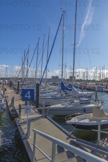 Strande marina near Kiel, Rendsburg-Eckernförde district, ship masts, jetty, Baltic Sea, sailing, leisure activities, water sports, summer, blue sky, sunshine, Bay of Kiel, Schleswig-Holstein, Germany