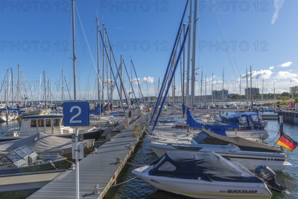 Strande marina near Kiel, Rendsburg-Eckernförde district, ship masts, jetty, Baltic Sea, sailing, leisure activities, water sports, flag, summer, blue sky, sunshine, Bay of Kiel, Schleswig-Holstein, Germany