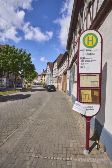 Bus stop Lehrstraße, half-timbered houses, general architecture, street, trees, car park with vehicles, blue sky, cumulus clouds, federal road B460, Lehrstraße, Heppenheim, Odenwald, Bergstraße district, Hesse, Germany