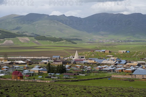A small village in a green mountain landscape with scattered houses and fields, Yazidi temple, Rya Taza, Ria Taza, Aragatsotn Province, Armenia