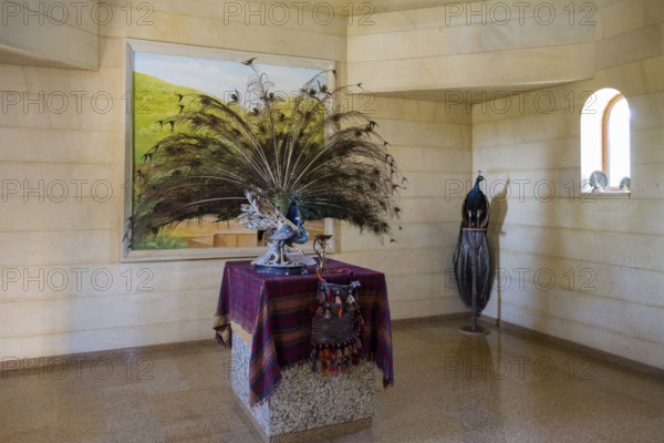 Interior view with peacock sculpture and colourful cloth on table, Yazidi temple, Yazidi temple, Ziyarat temple, Aknalich, Aknalich, Armavir district, Armenia