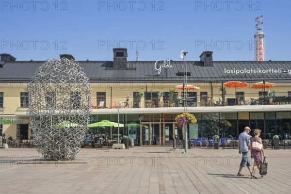 Passers-by, street scene, Lasipalatsi shopping centre, Narinkkatori, Helsinki, Finland