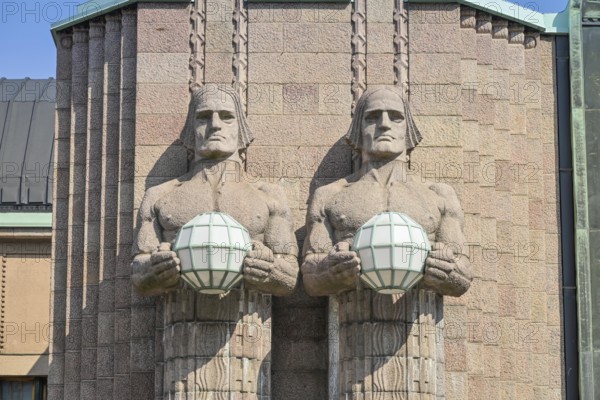 Figures on the façade, Kivimiehet, cairns, luminous glass globe, Art Nouveau, Central Station, Helsingin Päärautatieasema, Kaivokatu, Old Town, Helsinki, Finland