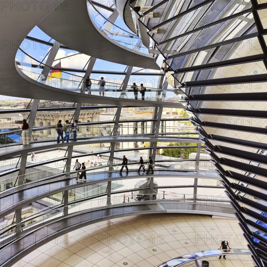 Interior view of the Reichstag dome with mirror cone and visitors, Reichstag building, landmark, government district, Berlin, Germany