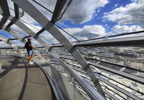 Interior view of the Reichstag dome with visitors on the ramp leading to the top, Reichstag building, government district, Berlin, Germany