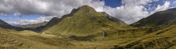 View from Passo del Sole to Passo dell'Uomo with waterfall, Alpe Carorescio with Piano Grande plateau, Quinto, Ticino, Switzerland