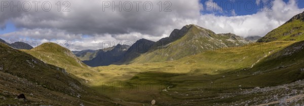 Panorama from Passo del Sole to Passo dell'Uomo and Alpe Carorescio with Piano Grande plateau, Quinto, Ticino, Switzerland
