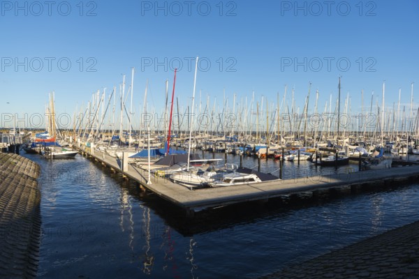 Olympic harbour Schilksee, Olympic Games 1972, sailing yachts at the jetty, ship masts, water reflection, sunshine, blue sky, Baltic Sea, Kiel Bay, Kiel Sailing City, Schleswig-Holstein, Germany