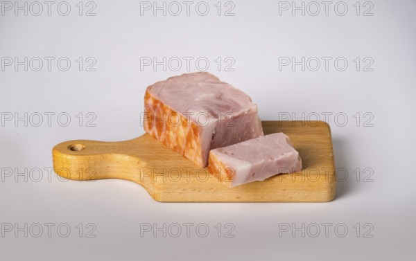 Smoked bacon on wooden board, copy space