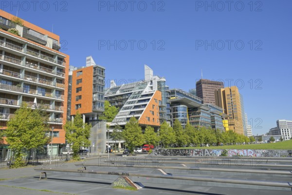 Disused seesaws, residential buildings, office buildings, Tilla-Durieux-Park, Potsdamer Platz, Tiergarten, Mitte, Berlin, Germany