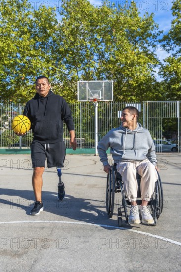 Two physically challenged men spending time together on a basketball court, one in a wheelchair and another with a prosthetic leg, sharing a moment of friendship and sportsmanship