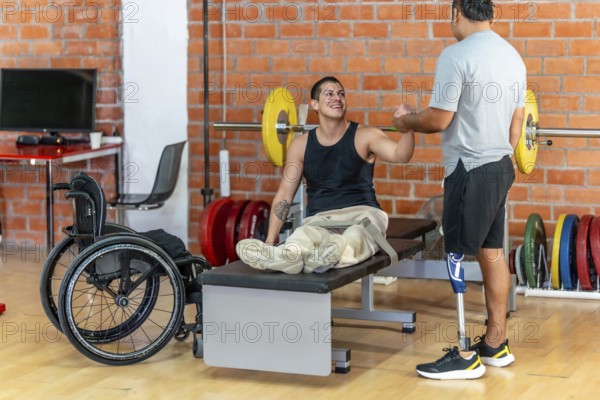 Two men with disabilities celebrate progress in a modern gym, fist bumping after a workout one using a wheelchair, the other with a prosthetic leg, smiling in solidarity and strength