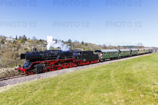 Fiery Elias steam train on the Strohgäubahn steam railway railway steam locomotive in Weissach, Germany