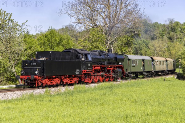 Fiery Elias steam train on the Strohgäubahn steam railway railway steam locomotive in Schwieberdingen, Germany