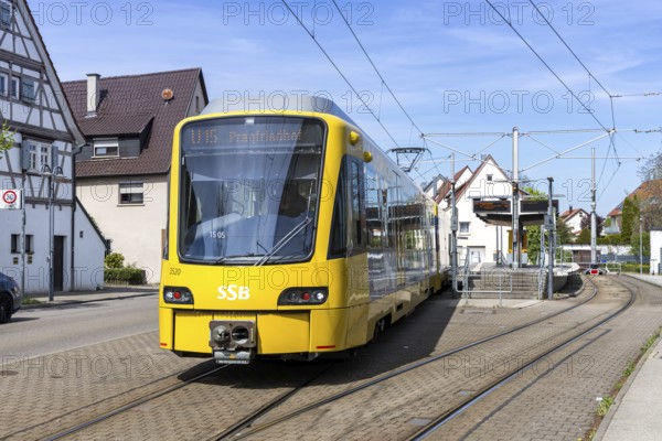 Stuttgart light rail vehicle type DT 8 public transport on line U15 at the Stammheim stop in Stuttgart, Germany