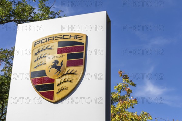 Porsche logo at the Porsche Centre Autohaus am Pragsattel in Stuttgart, Germany