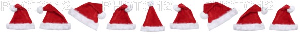 Christmas with Santa hats Santa hats Father Christmas in a row banner cropped against a white background in Stuttgart, Germany