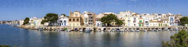 Colourful houses in Portocolom Fishing village on Majorca Panorama with boats Holiday by the sea Trip to Portocolom, Spain