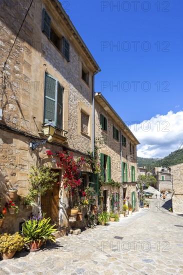 Valldemossa village on Majorca building with flowers trip in Valldemossa, Spain