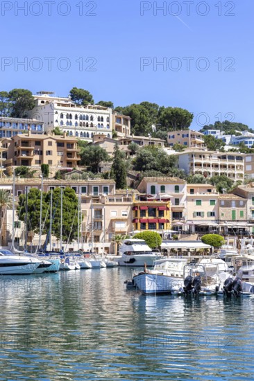 Port de Soller town on Majorca holiday by the sea yacht harbour with boats trip in Port de Sóller, Spain