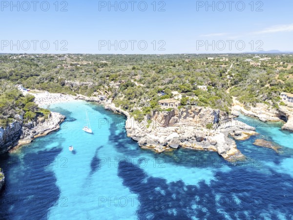 Aerial view of Cala Llombards beach on the island of Majorca from above in the Mediterranean Sea travelling in Cala Llombards, Spain