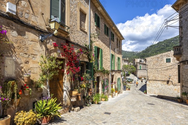 Valldemossa village on Majorca building with flowers trip in Valldemossa, Spain