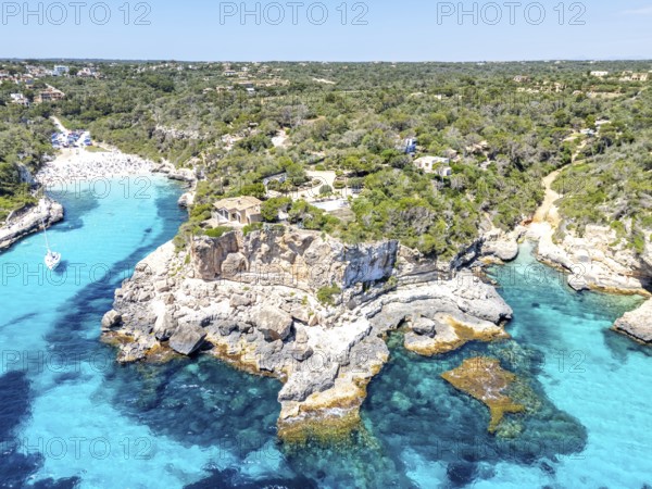 Aerial view of Cala Llombards beach on the island of Majorca from above in the Mediterranean Sea travelling in Cala Llombards, Spain