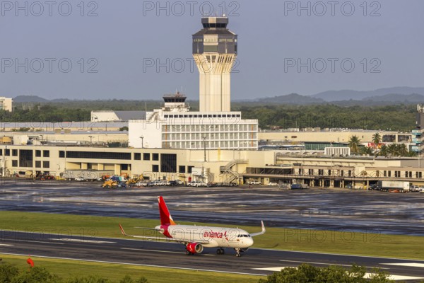 An Avianca Airbus A320 aircraft with the registration number N957AV at San Juan Airport, Puerto Rico