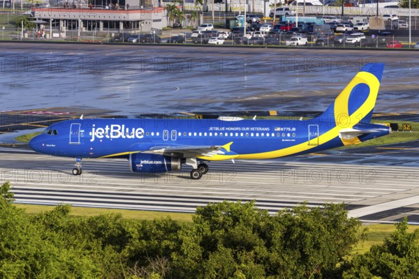 A JetBlue Airways Airbus A320 aircraft with the registration N775JB and the JetBlue Honours our Veterans special livery at San Juan Airport, Puerto Rico