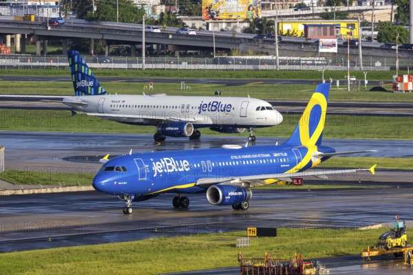A JetBlue Airways Airbus A320 aircraft with the registration N775JB and the JetBlue Honours our Veterans special livery at San Juan Airport, Puerto Rico