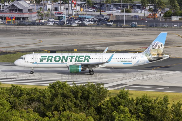 A Frontier Airlines Airbus A321 aircraft with the registration number N708FR at San Juan Airport, Puerto Rico
