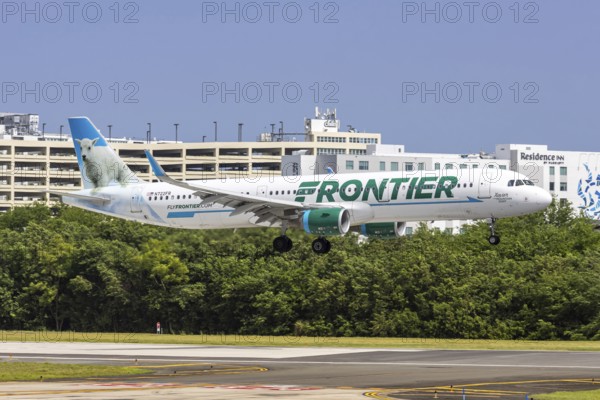 A Frontier Airlines Airbus A321 aircraft with registration N722FR at San Juan Airport, Puerto Rico