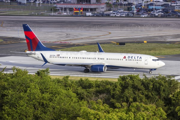 A Boeing 737-900ER aircraft of Delta Air Lines with the registration N837DN at San Juan Airport, Puerto Rico