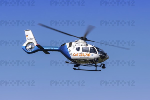 A Eurocopter EC 135P3 helicopter of the Bavarian Police with the registration number D-HBPF at Munich Airport, Germany