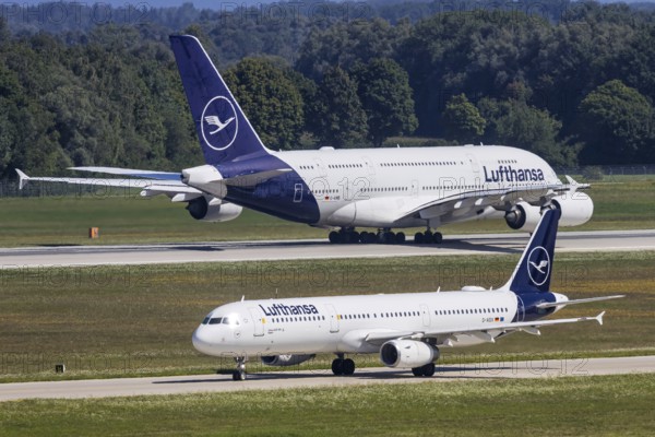 Airbus A380 and A321 aircraft of Lufthansa with the registration D-AIDX at Munich Airport, Germany