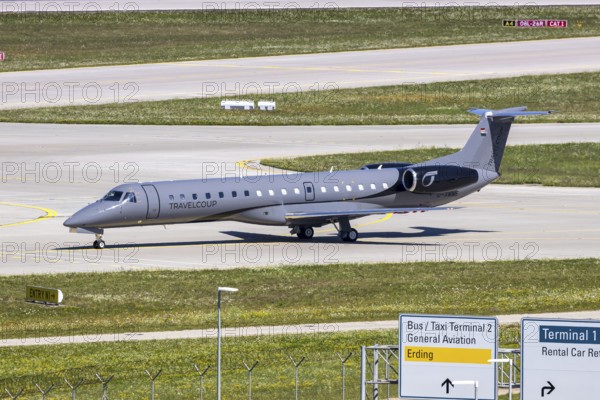 An Embraer ERJ 145 aircraft of Travelcoup with the registration D-AMME at Munich Airport, Germany