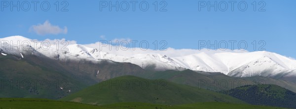 Snow-covered mountain range under a clear blue sky, landscape near Saratovka, Lesser Caucasus, Lorikeet Province, Armenia