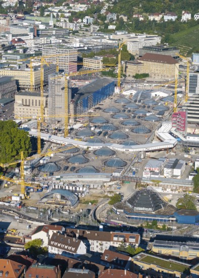 Large construction site in the city with numerous cranes and modern building structures on a sunny day, Large construction site, Stuttgart railway station, Stuttgart 21, Baden-Württemberg, Germany