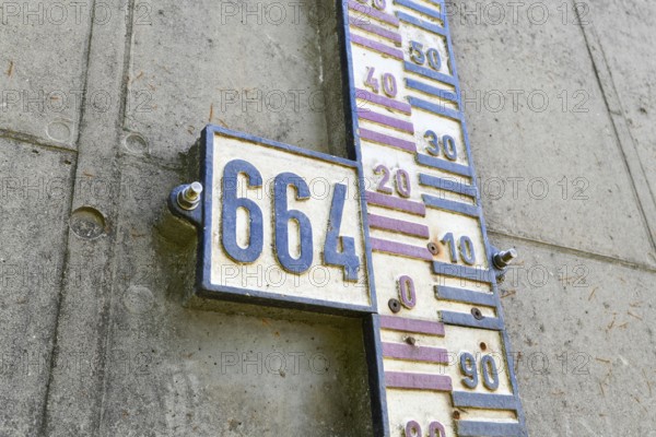 Close up of water level gauge on dam wall at Schwarzenbachtalsperre in the Black Forest region in Germany