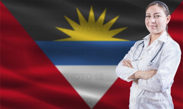 Female doctor on Antigua and Barbuda flag. Doctor with crossed arms on Antigua and Barbuda flag. Antigua and Barbuda health and care concept