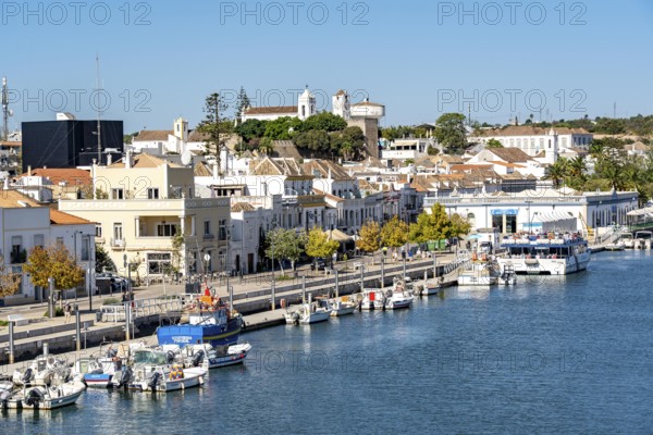 The old town centre of Tavira, on the Gilao River, boats, fishing boats, waterfront promenade, in the Algarve, Portugal