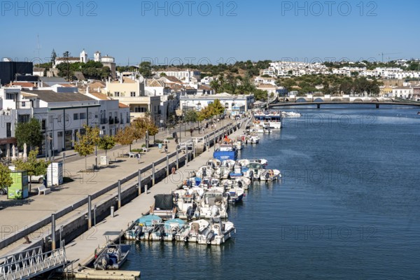 The old town centre of Tavira, on the Gilao River, boats, fishing boats, waterfront promenade, in the Algarve, Portugal