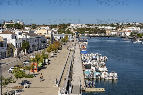 The old town centre of Tavira, on the Gilao River, boats, fishing boats, waterfront promenade, in the Algarve, Portugal