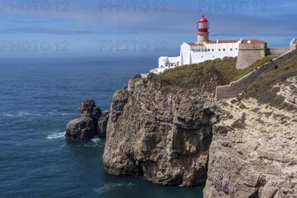 Cabo de São Vicente lighthouse, at the Cape Cabo de São Vicente, south-west tip of the European mainland, rocky coast, steep coast in the south-west of the Algarve, Portugal