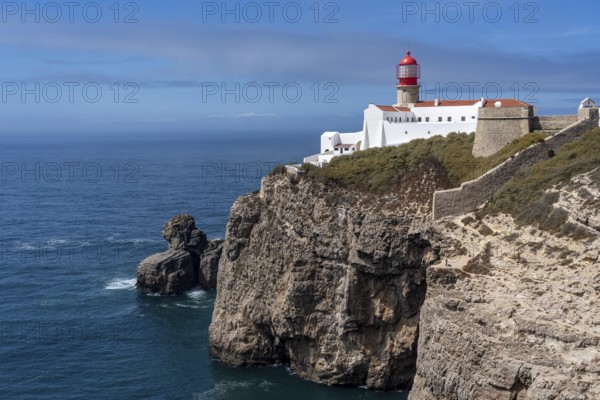 Cabo de São Vicente lighthouse, at the Cape Cabo de São Vicente, south-west tip of the European mainland, rocky coast, steep coast in the south-west of the Algarve, Portugal
