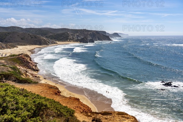 Praia do Amado beach near Carrapateira, popular with surfers, wave riders, rocky coast, steep coast in the south-west of the Algarve, Portugal