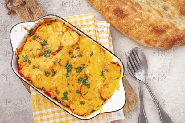Madame Bovary's Georgian dish, chicken fillet with mushrooms, tomatoes and cheese, baked in a mold